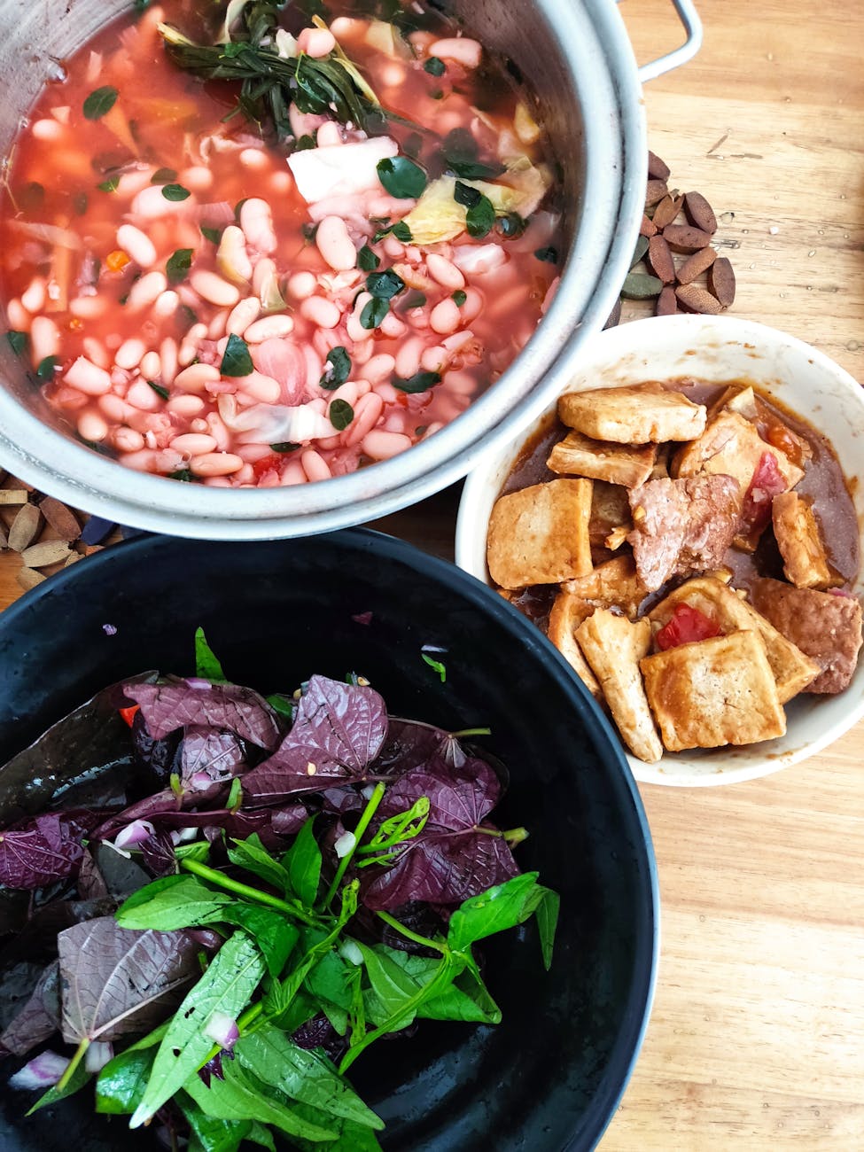 close up of a plant based meal with a salad beans and tofu
