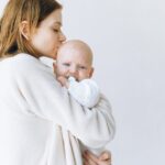 Photo by Anna Shvets on <a href="https://www.pexels.com/photo/mother-kissing-her-baby-3845407/" rel="nofollow">Pexels.com</a>