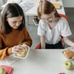Photo by Pavel Danilyuk on <a href="https://www.pexels.com/photo/girls-sitting-at-the-table-8423409/" rel="nofollow">Pexels.com</a>